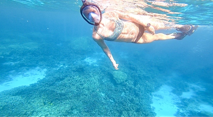 #1 Hawaii travel tip - Go snorkeling! Courtney snorkeling at Two Step