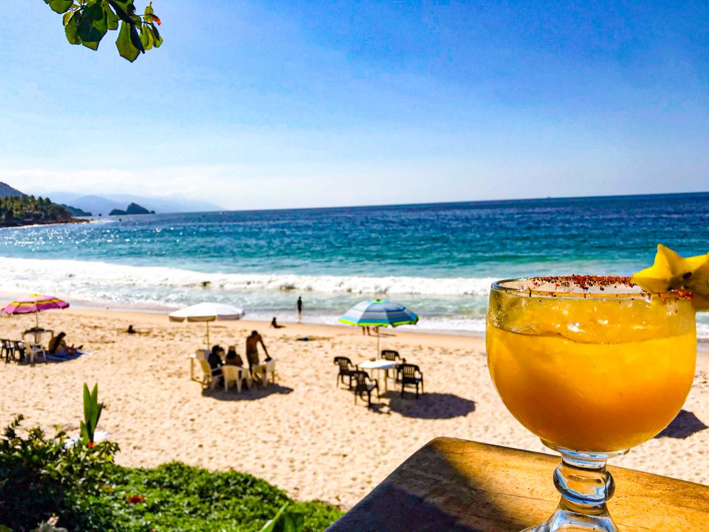 passion fruit margarita on the beach