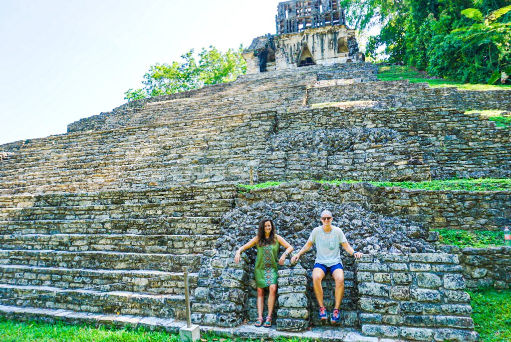 Palenque ruins posing in front of building